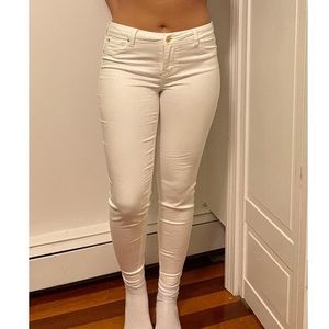 ankle skinny jeans • gold zipper behind ankles • never worn